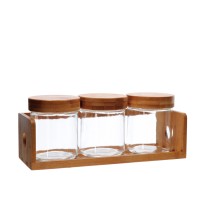 Set 3 barattoli in vetro con coperchio e supporto in bamboo - diam. cm. 10,5 x h. cm. 12,5 / supporto: cm. 34 x 12,5 x h. cm. 9